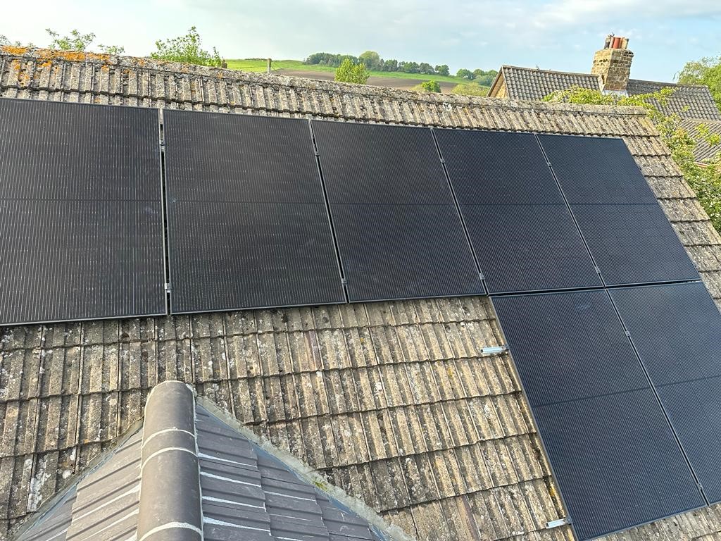 1 Solar panels on roof around a dormer loft conversion