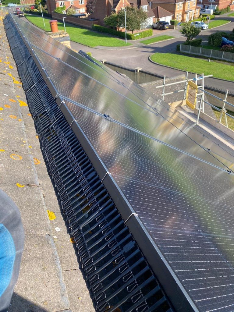 1 Birds eye view of solar panels on a roof