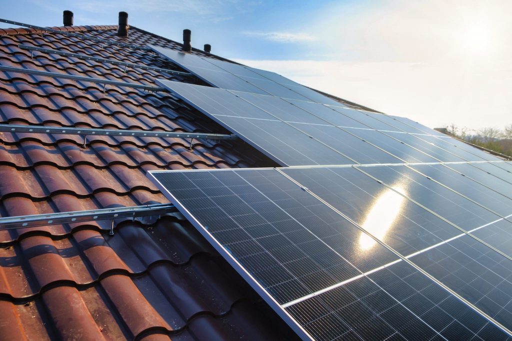Sun shining on domestic solar panels
