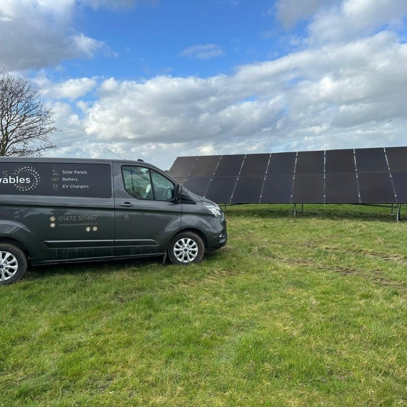 the sign written lincs renewables van in-front of ground mounted solar panels